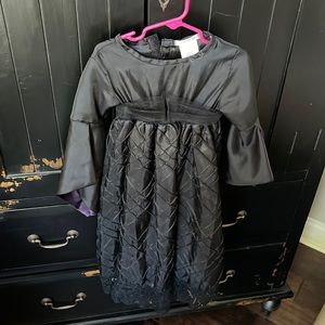 Halloween witch costume made by Pottery Barn kids perfect for Halloween costume.